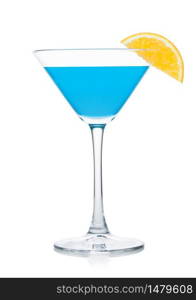 Blue lagoon summer cocktail in martini glass with orange slice on white background.