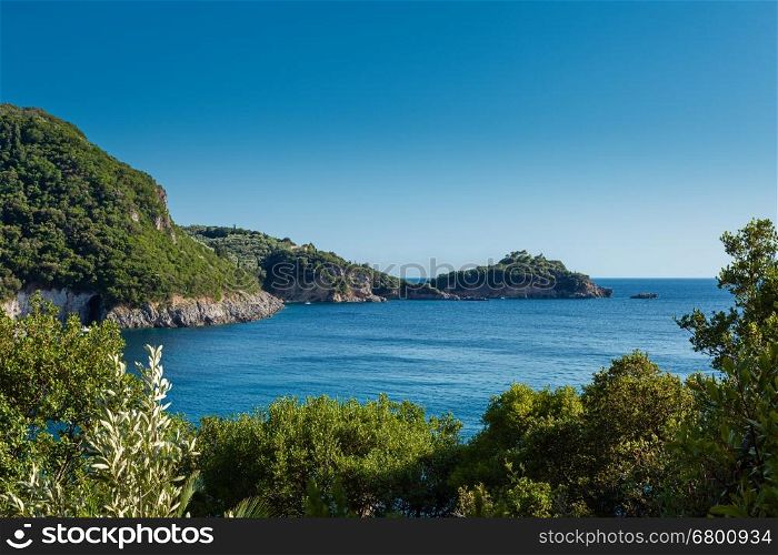 Blue lagoon surrounded with rocky coast, Corfu, Greece