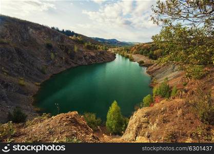Blue lake in Altai. This is a former copper mine that was flooded with water. Blue lake in Altai