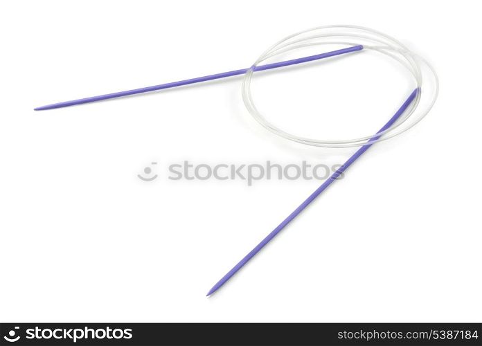 Blue metal circular knitting needles isolated on white