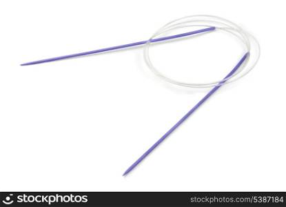 Blue metal circular knitting needles isolated on white