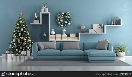 Blue modern living room with christmas tree. Blue modern living room with christmas tree,elegant sofa and white shelf with decor objects - 3d rendering