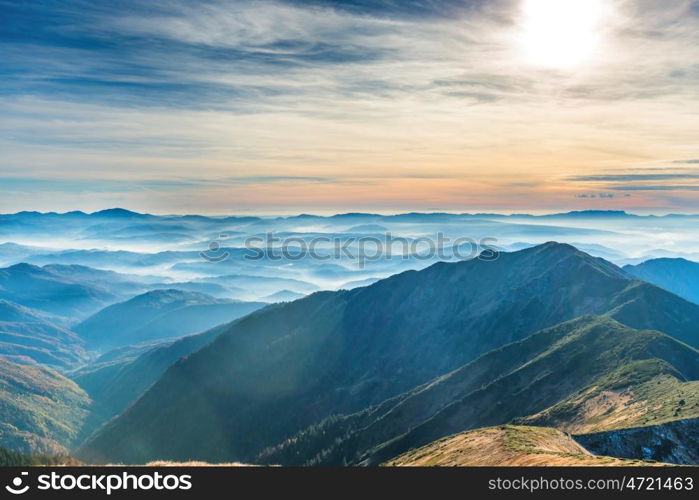 Blue mountains and hills over beautiful sunset