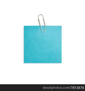 Blue note paper with paper clip on white background.. Glass bottle