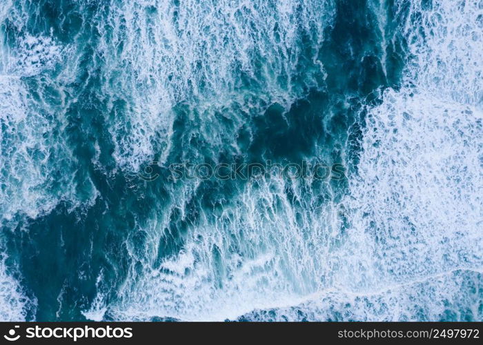 Blue ocean waves aerial drone top view