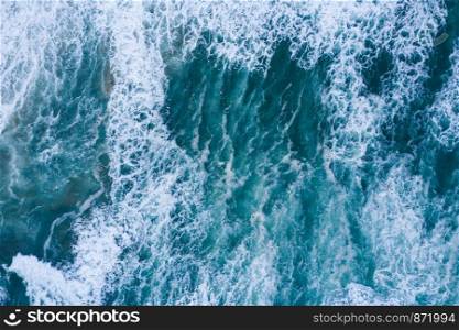 Blue ocean waves aerial drone top view