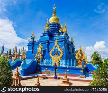 Blue pagoda at Wat Rong Sua Ten temple Chiang Rai Province, Thailand, It?s a popular destination and Landmark of Chiang Rai, Translation text in the image