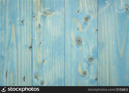 blue painted wooden board with graine and knots