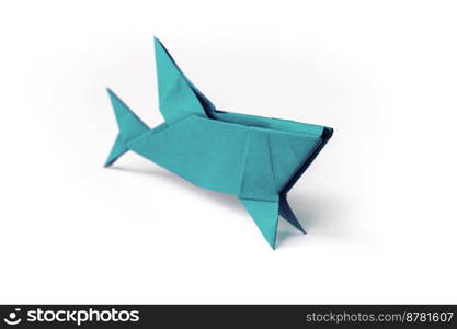 Blue paper shark origami isolated on a blank white background. Blue paper shark origami isolated on a white background