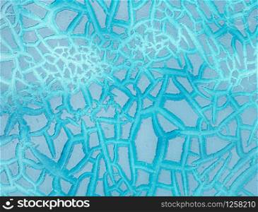 Blue peeling paint on the metal surface texture background