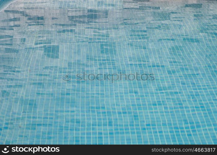 Blue pool water moved by the waves