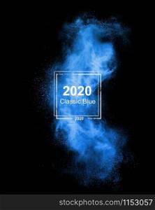 Blue powder explosion isolated on a black background, copy space. Trend color of the year 2020.. Classic blue smoke of trend colour of the year 2020.