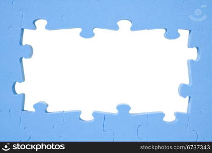 blue puzzle frame with space for text