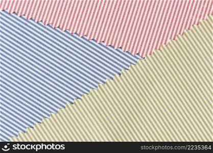 blue red green curved textile fabric background