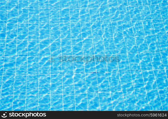 Blue ruppled water on swimming pool