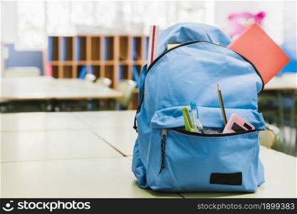 blue schoolchild backpack table. Resolution and high quality beautiful photo. blue schoolchild backpack table. High quality beautiful photo concept