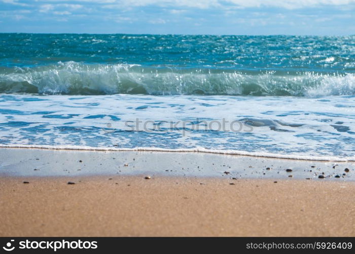 Blue sea and beach with golden sand. Summer vacation background