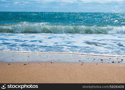 Blue sea and beach with golden sand. Summer vacation background