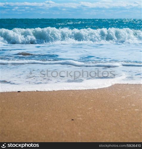 Blue sea and beach with golden sand. Summer vacation background
