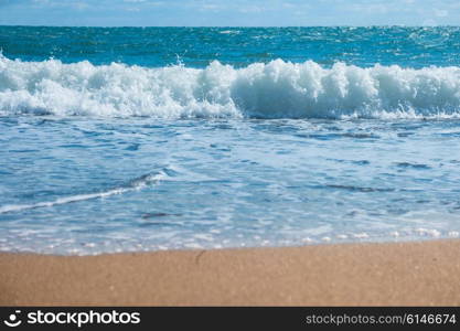 Blue sea and beach with golden sand. Summer vacation background