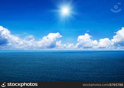 blue sea and clouds on sky