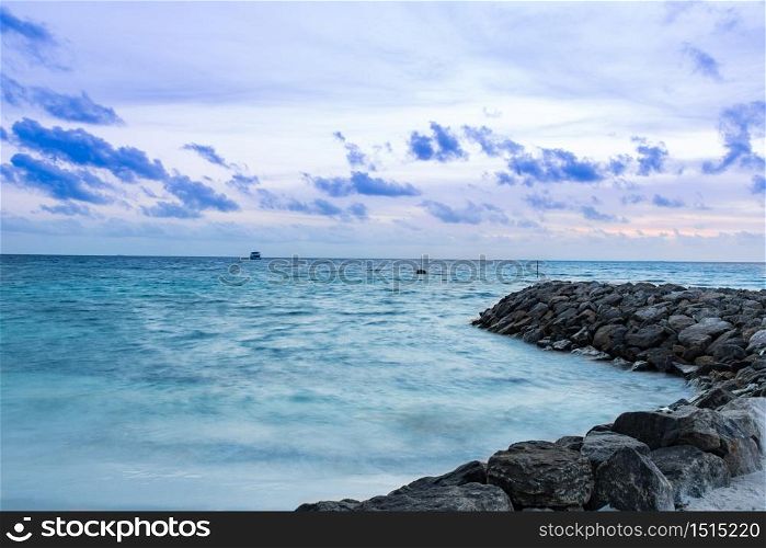 Blue sea and sky with clouds in Maldives