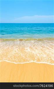 Blue sea blue water and sand beach with blue sky as summer holiday vacation background
