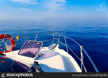 Blue sea boat sailing with open bow porthole in summer vacations