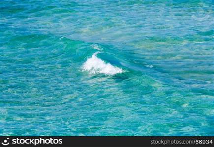 Blue sea flowing water surface with waves and some bottom view. Abstract background pattern.