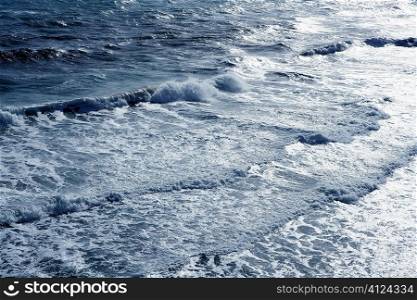 Blue sea ocean waves detail viewed from bird view
