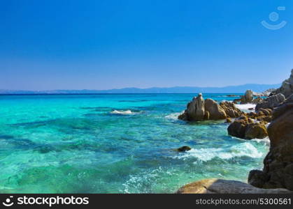 Blue sea shore under clear sky