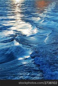 blue sea water waves sunset from boat stern ship wake