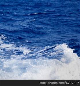 blue sea wave foam detail in square composition