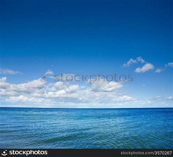Blue sea with waves and clear blue sky&#xA;