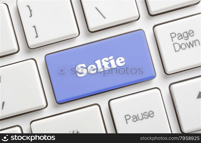 Blue selfie key on keyboard