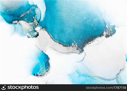 Blue silver abstract background of marble liquid ink art painting on paper . Image of original artwork watercolor alcohol ink paint on high quality paper texture .. Blue silver abstract background of marble liquid ink art painting on paper .