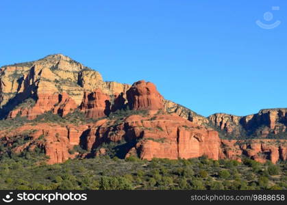 Blue skies around bell rock in Sedona Arizona.