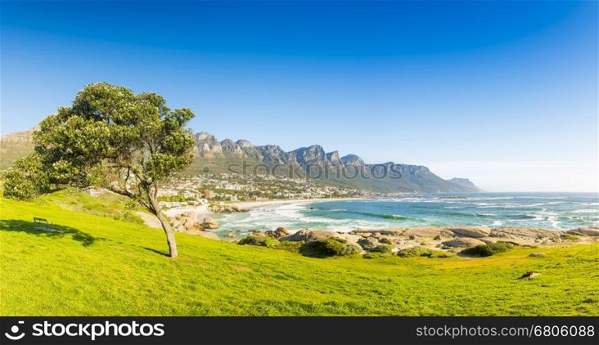 Blue skies over Camps Bay in Cape Town, South Africa panorama