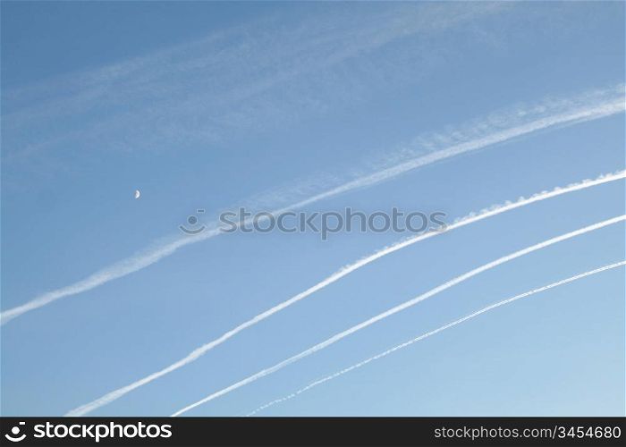 blue sky and airplane lines