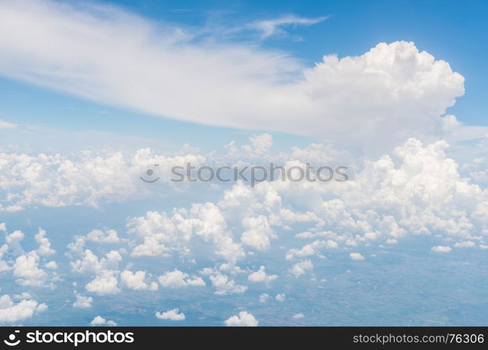 Blue sky and beautiful clouds.View from window of an airplane.