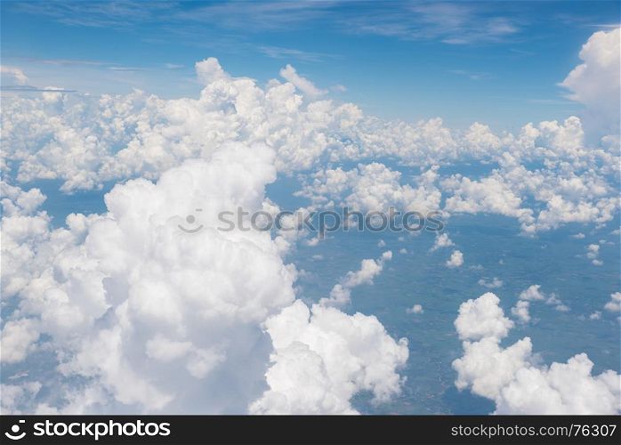 Blue sky and beautiful clouds.View from window of an airplane.