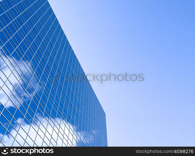 Blue sky and clouds reflected on this clear winter afternoon.