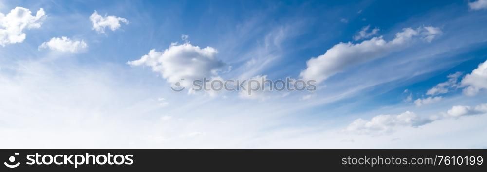 Blue sky and clouds. Summer day background. Blue sky and clouds