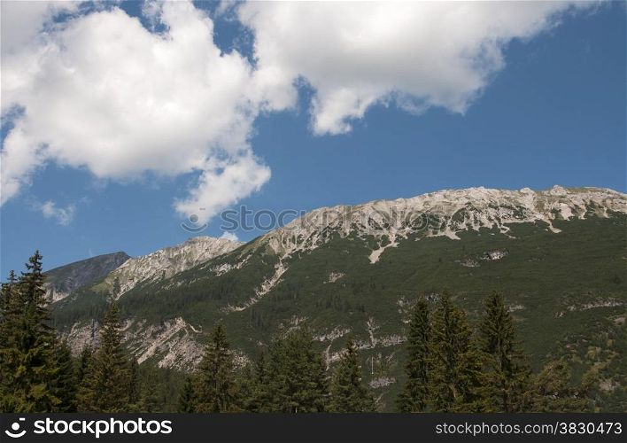 blue sky and green mountains in north austria