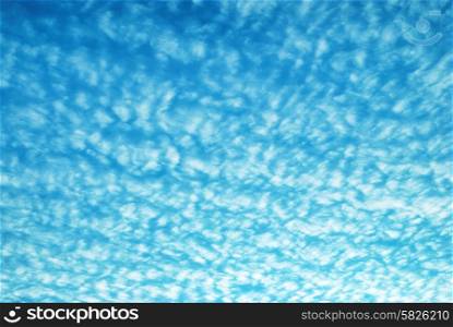 Blue sky and texture of white clouds.