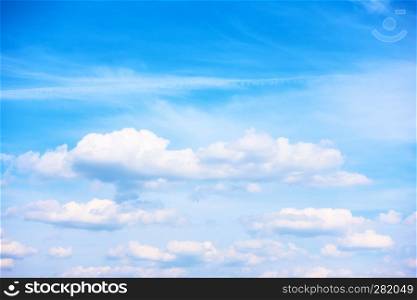 Blue sky and white heap clouds - background