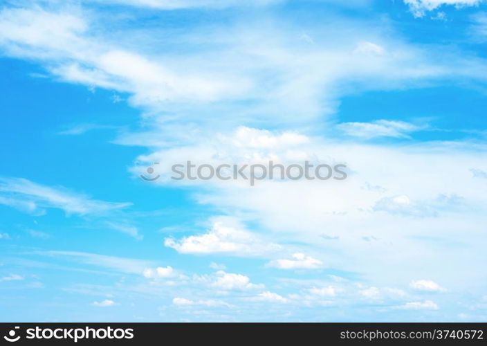 Blue sky background with a tiny clouds