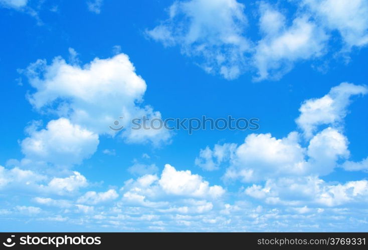 Blue sky background with a tiny clouds