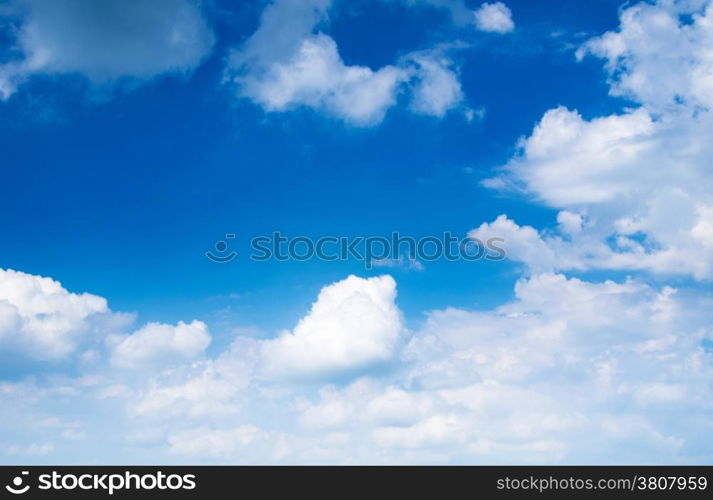 Blue sky background with a tiny clouds