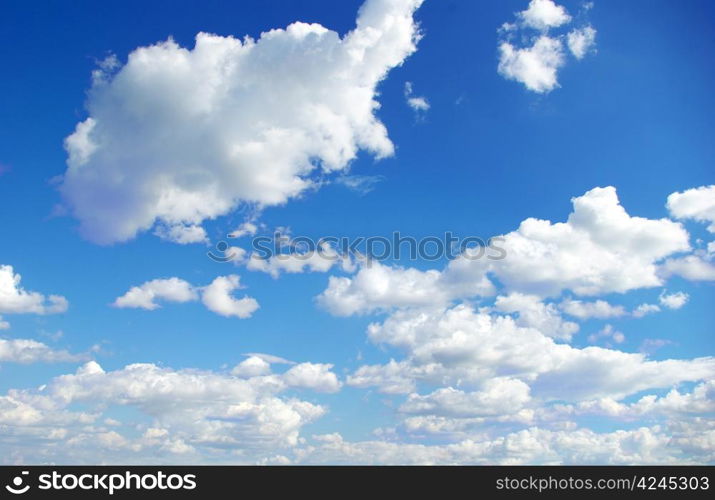 Blue sky background with a tiny clouds